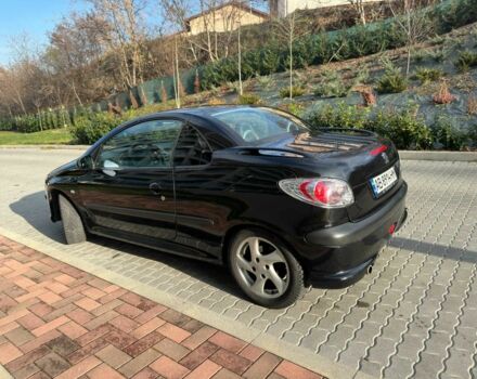 Черный Пежо 206, объемом двигателя 1.6 л и пробегом 230 тыс. км за 4096 $, фото 3 на Automoto.ua