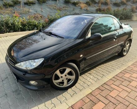 Черный Пежо 206, объемом двигателя 1.6 л и пробегом 230 тыс. км за 4096 $, фото 4 на Automoto.ua