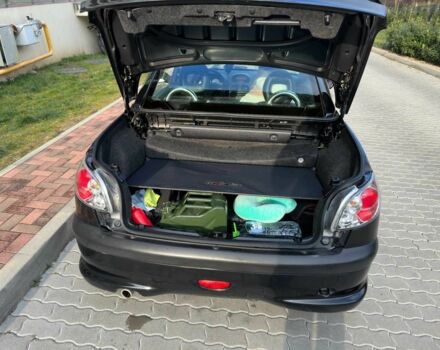 Черный Пежо 206, объемом двигателя 1.6 л и пробегом 230 тыс. км за 4096 $, фото 18 на Automoto.ua