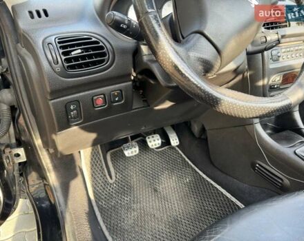 Черный Пежо 206, объемом двигателя 1.59 л и пробегом 231 тыс. км за 3600 $, фото 11 на Automoto.ua