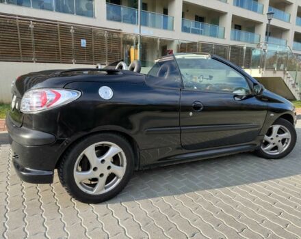 Черный Пежо 206, объемом двигателя 1.6 л и пробегом 230 тыс. км за 4096 $, фото 9 на Automoto.ua