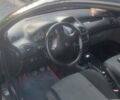 Черный Пежо 206, объемом двигателя 1.6 л и пробегом 214 тыс. км за 2900 $, фото 3 на Automoto.ua