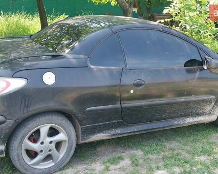 Черный Пежо 206, объемом двигателя 1.6 л и пробегом 150 тыс. км за 3000 $, фото 4 на Automoto.ua