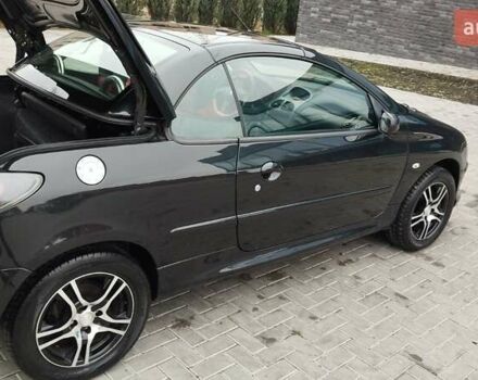 Черный Пежо 206, объемом двигателя 1.59 л и пробегом 216 тыс. км за 3800 $, фото 4 на Automoto.ua