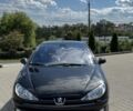 Черный Пежо 206, объемом двигателя 1.6 л и пробегом 175 тыс. км за 4700 $, фото 1 на Automoto.ua