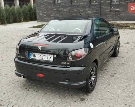 Черный Пежо 206, объемом двигателя 1.59 л и пробегом 216 тыс. км за 3800 $, фото 2 на Automoto.ua