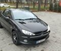 Черный Пежо 206, объемом двигателя 1.59 л и пробегом 216 тыс. км за 3800 $, фото 1 на Automoto.ua