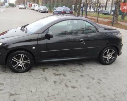 Черный Пежо 206, объемом двигателя 1.59 л и пробегом 216 тыс. км за 3800 $, фото 1 на Automoto.ua