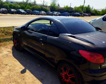 Черный Пежо 206, объемом двигателя 1.6 л и пробегом 236 тыс. км за 2200 $, фото 5 на Automoto.ua