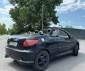 Черный Пежо 206, объемом двигателя 1.6 л и пробегом 110 тыс. км за 4200 $, фото 1 на Automoto.ua
