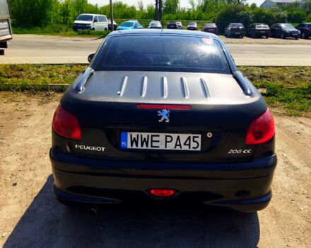 Черный Пежо 206, объемом двигателя 1.6 л и пробегом 236 тыс. км за 2200 $, фото 4 на Automoto.ua