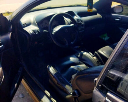 Черный Пежо 206, объемом двигателя 1.6 л и пробегом 236 тыс. км за 2200 $, фото 7 на Automoto.ua