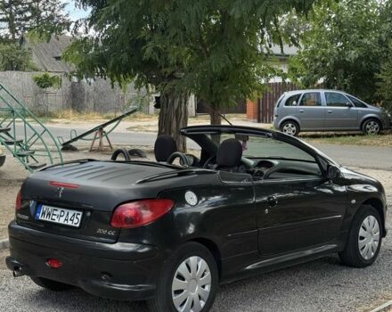Чорний Пежо 206, об'ємом двигуна 1.4 л та пробігом 280 тис. км за 1490 $, фото 5 на Automoto.ua