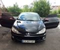 Черный Пежо 206, объемом двигателя 1.6 л и пробегом 180 тыс. км за 5300 $, фото 1 на Automoto.ua
