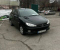 Чорний Пежо 206, об'ємом двигуна 1.36 л та пробігом 237 тис. км за 3000 $, фото 2 на Automoto.ua