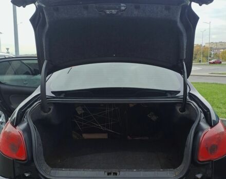 Черный Пежо 206, объемом двигателя 1.4 л и пробегом 406 тыс. км за 2000 $, фото 6 на Automoto.ua