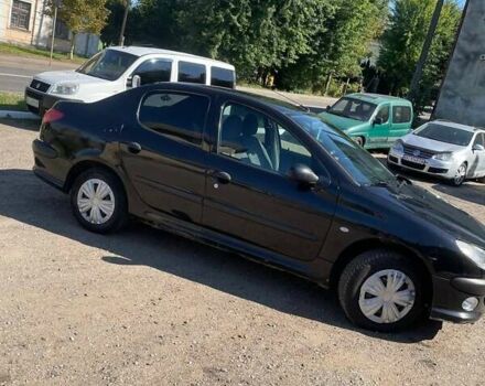 Чорний Пежо 206, об'ємом двигуна 1.36 л та пробігом 230 тис. км за 3200 $, фото 3 на Automoto.ua