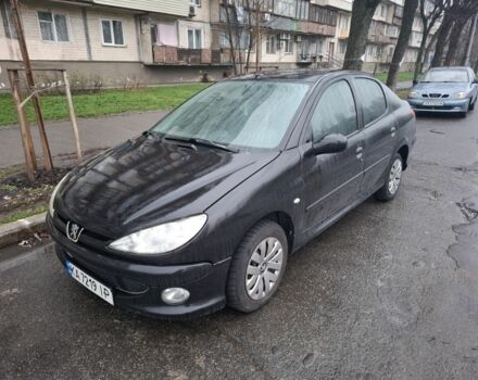 Черный Пежо 206, объемом двигателя 1.4 л и пробегом 151 тыс. км за 3900 $, фото 3 на Automoto.ua