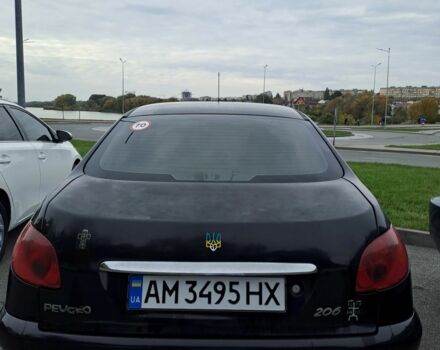 Черный Пежо 206, объемом двигателя 1.4 л и пробегом 406 тыс. км за 2000 $, фото 2 на Automoto.ua