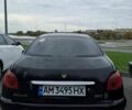 Черный Пежо 206, объемом двигателя 1.4 л и пробегом 406 тыс. км за 2000 $, фото 2 на Automoto.ua