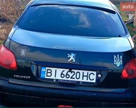 Чорний Пежо 206, об'ємом двигуна 1.36 л та пробігом 260 тис. км за 3850 $, фото 3 на Automoto.ua