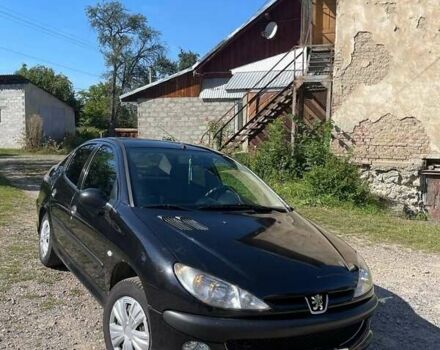Чорний Пежо 206, об'ємом двигуна 1.36 л та пробігом 230 тис. км за 3200 $, фото 1 на Automoto.ua
