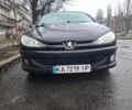 Черный Пежо 206, объемом двигателя 1.4 л и пробегом 151 тыс. км за 3900 $, фото 1 на Automoto.ua