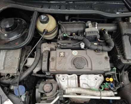 Черный Пежо 206, объемом двигателя 1.4 л и пробегом 151 тыс. км за 3900 $, фото 4 на Automoto.ua