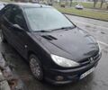 Черный Пежо 206, объемом двигателя 1.4 л и пробегом 151 тыс. км за 3900 $, фото 6 на Automoto.ua