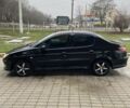 Черный Пежо 206, объемом двигателя 1.4 л и пробегом 276 тыс. км за 1950 $, фото 2 на Automoto.ua