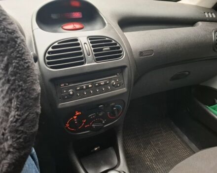 Черный Пежо 206, объемом двигателя 1.4 л и пробегом 151 тыс. км за 3900 $, фото 8 на Automoto.ua