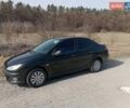 Черный Пежо 206, объемом двигателя 1.36 л и пробегом 170 тыс. км за 3500 $, фото 1 на Automoto.ua