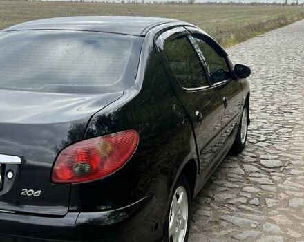 Пежо 206 2008 в Никополе на Automoto.ua Черный Пежо 206, объемом двигателя 1.36 л и пробегом 139 тыс. км за 4300 $, фото 10 на Automoto.ua