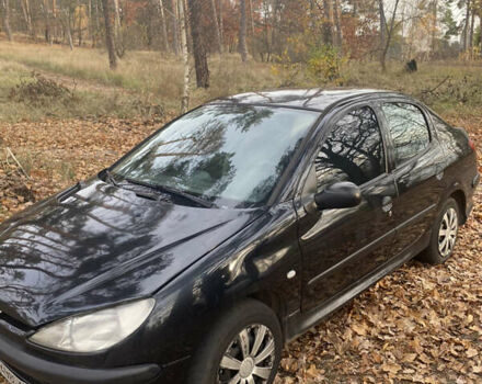 Черный Пежо 206, объемом двигателя 1.4 л и пробегом 148 тыс. км за 2100 $, фото 1 на Automoto.ua
