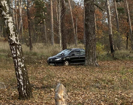 Черный Пежо 206, объемом двигателя 1.4 л и пробегом 148 тыс. км за 2100 $, фото 9 на Automoto.ua