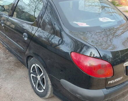 Черный Пежо 206, объемом двигателя 1.36 л и пробегом 107 тыс. км за 3900 $, фото 2 на Automoto.ua