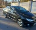 Черный Пежо 206, объемом двигателя 1.36 л и пробегом 270 тыс. км за 1900 $, фото 1 на Automoto.ua