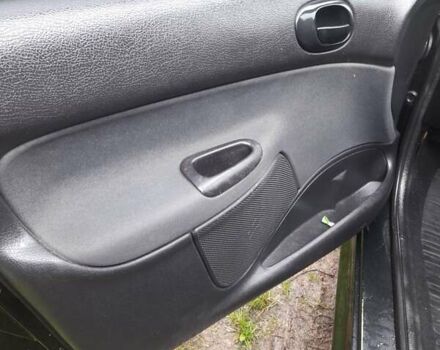 Черный Пежо 206, объемом двигателя 1.4 л и пробегом 286 тыс. км за 3160 $, фото 13 на Automoto.ua