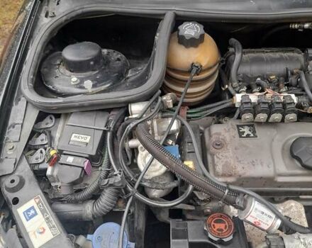 Черный Пежо 206, объемом двигателя 1.4 л и пробегом 286 тыс. км за 3160 $, фото 21 на Automoto.ua