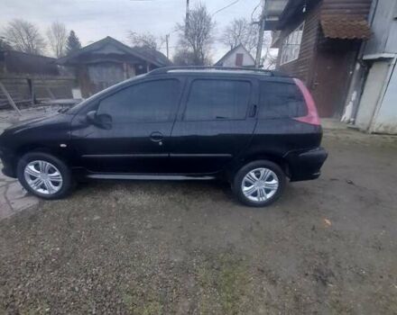 Черный Пежо 206, объемом двигателя 1.4 л и пробегом 298 тыс. км за 2896 $, фото 3 на Automoto.ua