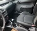 Черный Пежо 206, объемом двигателя 1.4 л и пробегом 286 тыс. км за 3160 $, фото 10 на Automoto.ua