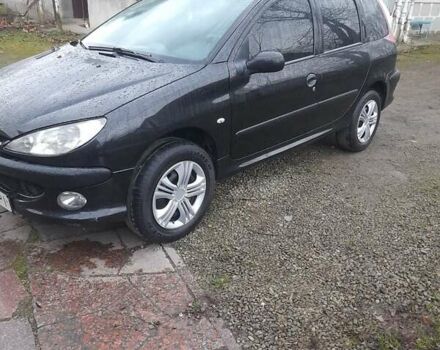 Черный Пежо 206, объемом двигателя 1.4 л и пробегом 298 тыс. км за 2896 $, фото 2 на Automoto.ua