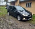 Черный Пежо 206, объемом двигателя 1.4 л и пробегом 298 тыс. км за 2896 $, фото 8 на Automoto.ua