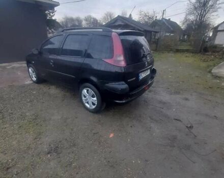 Черный Пежо 206, объемом двигателя 1.4 л и пробегом 298 тыс. км за 2896 $, фото 5 на Automoto.ua