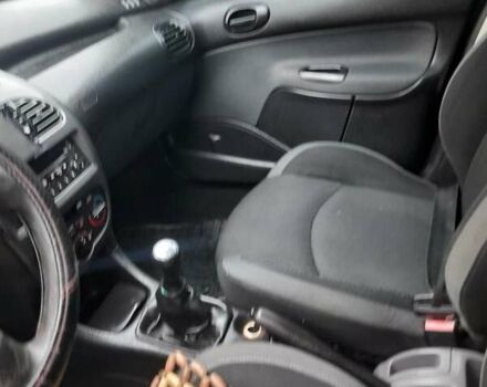 Черный Пежо 206, объемом двигателя 1.4 л и пробегом 298 тыс. км за 2896 $, фото 12 на Automoto.ua