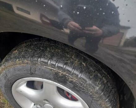 Черный Пежо 206, объемом двигателя 1.4 л и пробегом 286 тыс. км за 3160 $, фото 16 на Automoto.ua