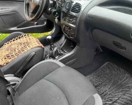 Черный Пежо 206, объемом двигателя 1.4 л и пробегом 286 тыс. км за 3160 $, фото 8 на Automoto.ua