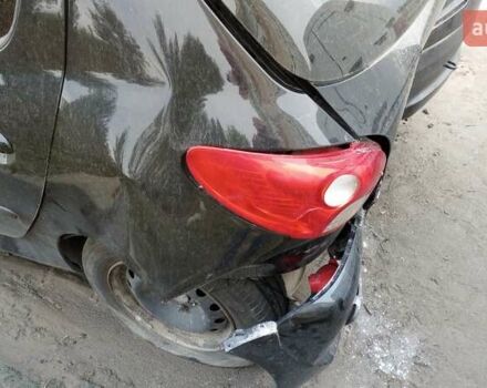 Чорний Пежо 206, об'ємом двигуна 1.36 л та пробігом 153 тис. км за 2500 $, фото 5 на Automoto.ua