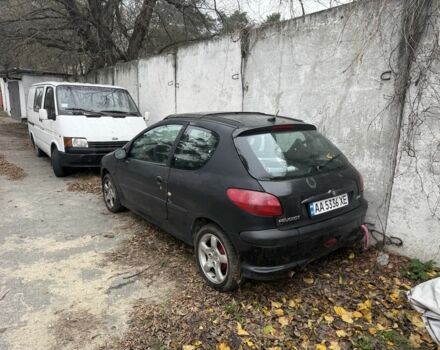 Черный Пежо 206, объемом двигателя 1.4 л и пробегом 240 тыс. км за 1200 $, фото 1 на Automoto.ua