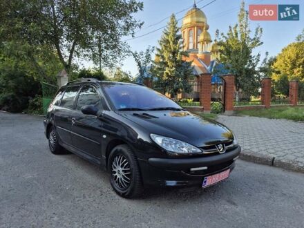 Черный Пежо 206, объемом двигателя 1.4 л и пробегом 202 тыс. км за 3950 $, фото 1 на Automoto.ua